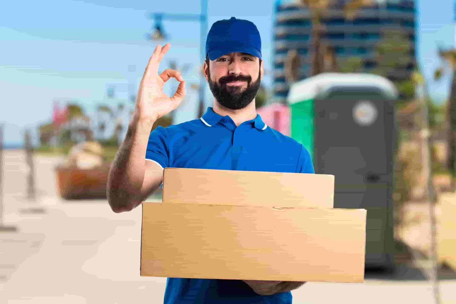 Delivery man making OK sign